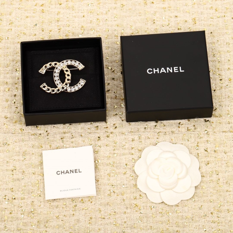 Ch*el brooches